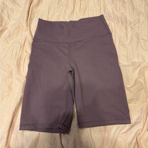 Fabletics High-Waist Bike Shorts in Plum Mauve